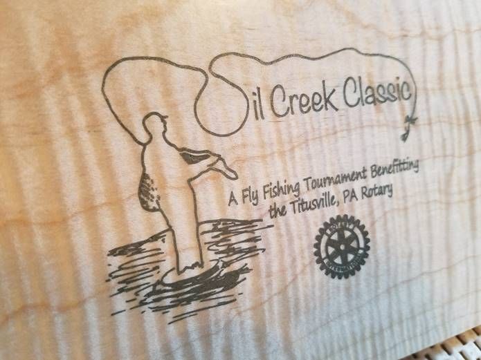 Printed wooden sign for the Oil Creek Classic of the Titusville Rotary Club
